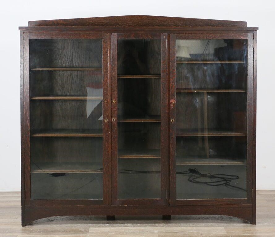 Appraisal: Mission oak arts and crafts bookcase Early th century shelves