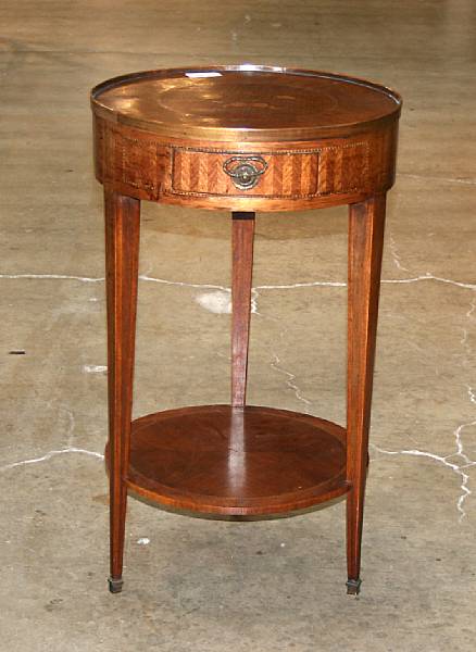 Appraisal: A Louis XVI style marquetry inlaid mahogany bouillotte table height