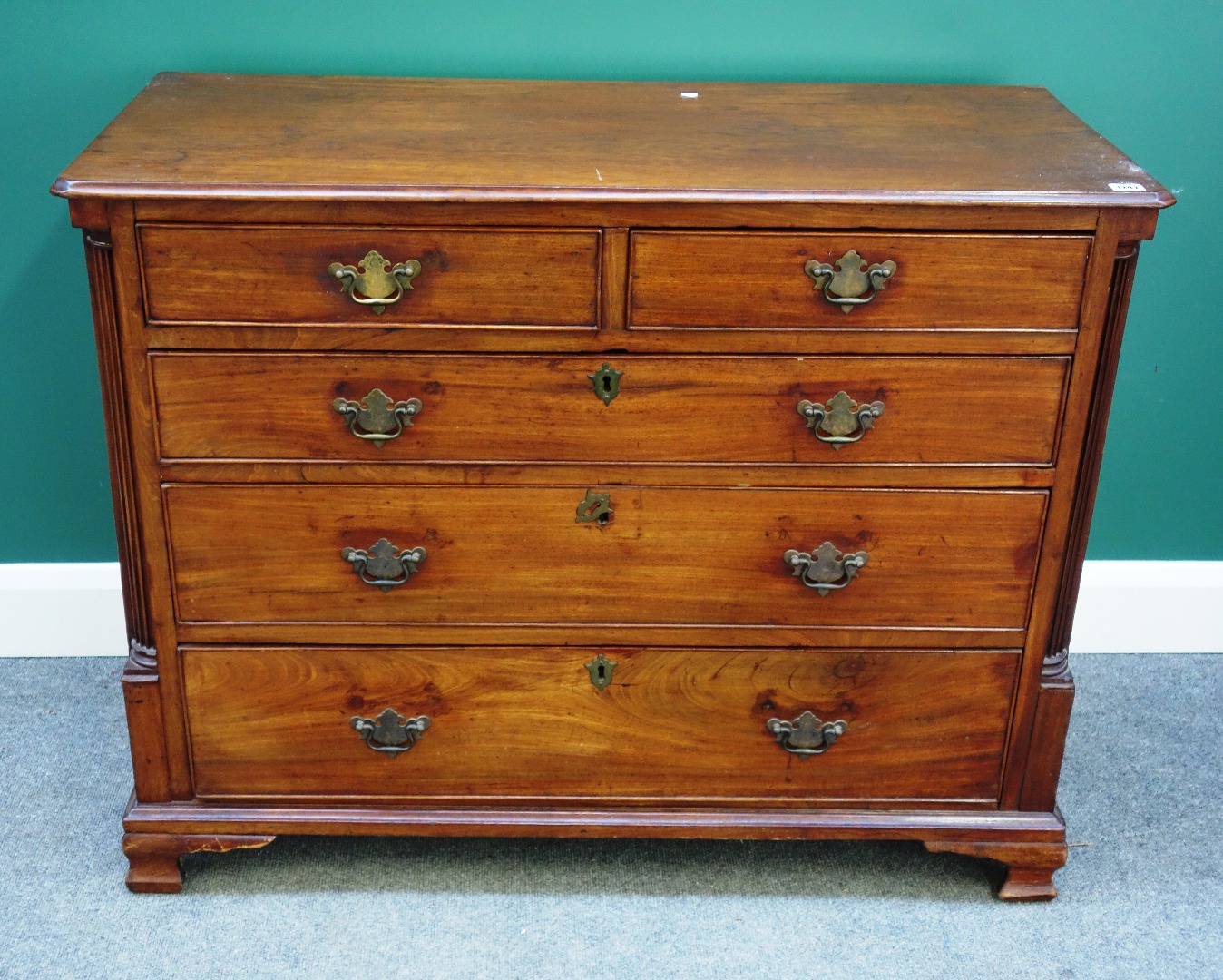 Appraisal: A mid- th century mahogany chest of two short and