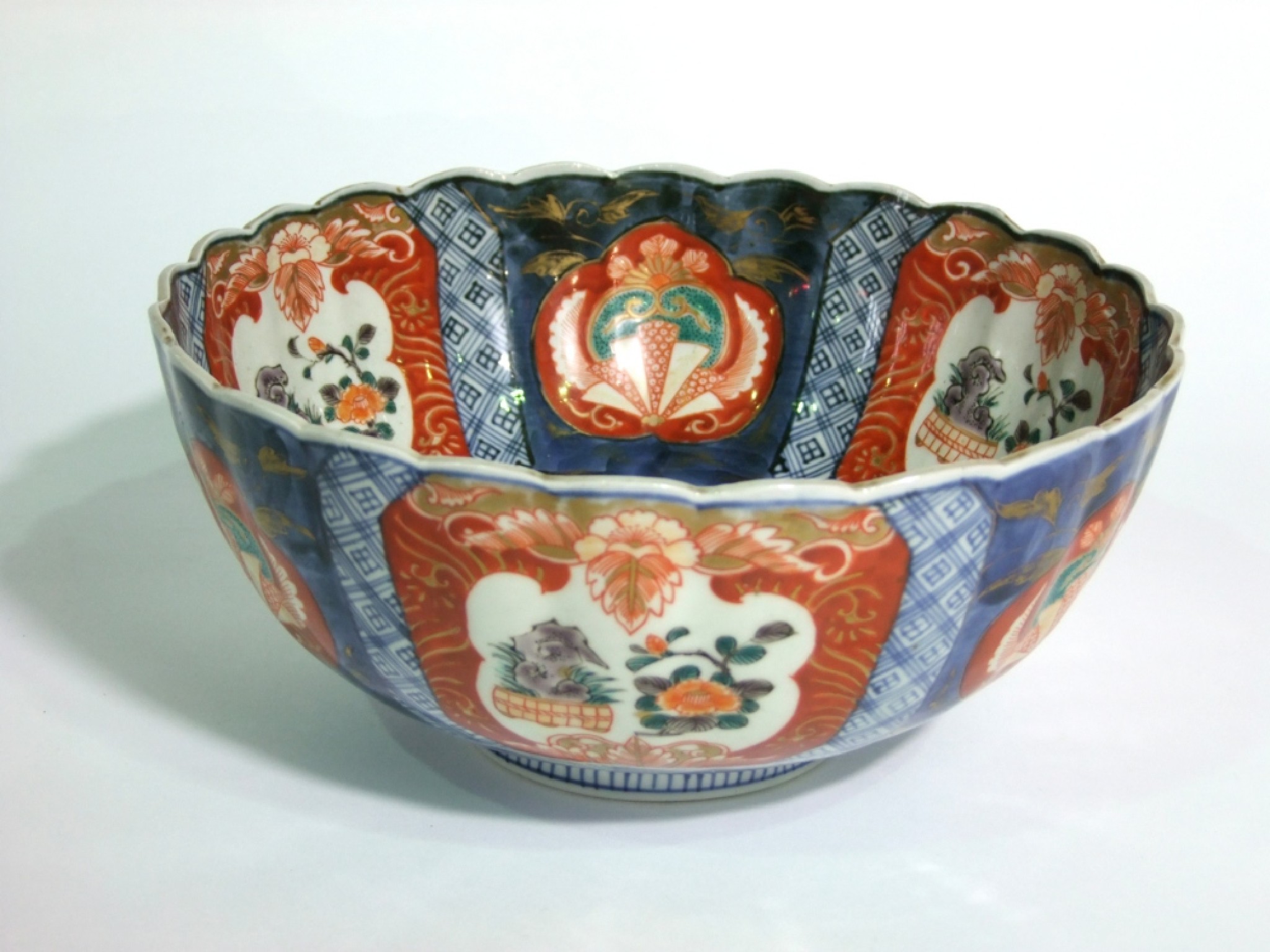 Appraisal: A th century Imari punch bowl with fluted rim and