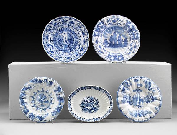 Appraisal: A group of four Continental blue and white earthenware dishes