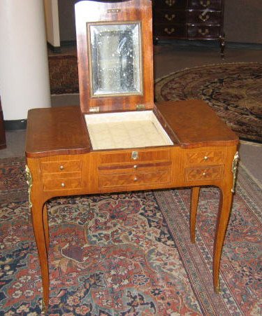 Appraisal: LOUIS XV XVI TRANSITIONAL STYLE DRESSING TABLE Finely decorated allover