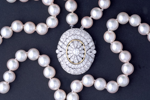 Appraisal: Double strand Japanese akoya pearl necklace with diamond clasp in