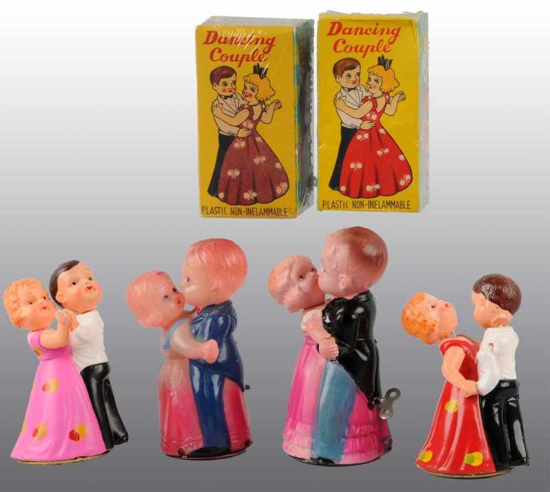 Appraisal: Lot of Celluloid Dancing Couple Wind-Up Toys Description Japanese Working