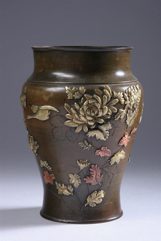 Appraisal: JAPANESE MIXED METAL VASE Meiji period Bird and floral decoration