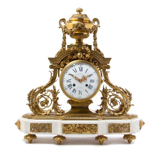 Appraisal: Sale Lot A French Gilt Bronze and Marble Mantel Clock