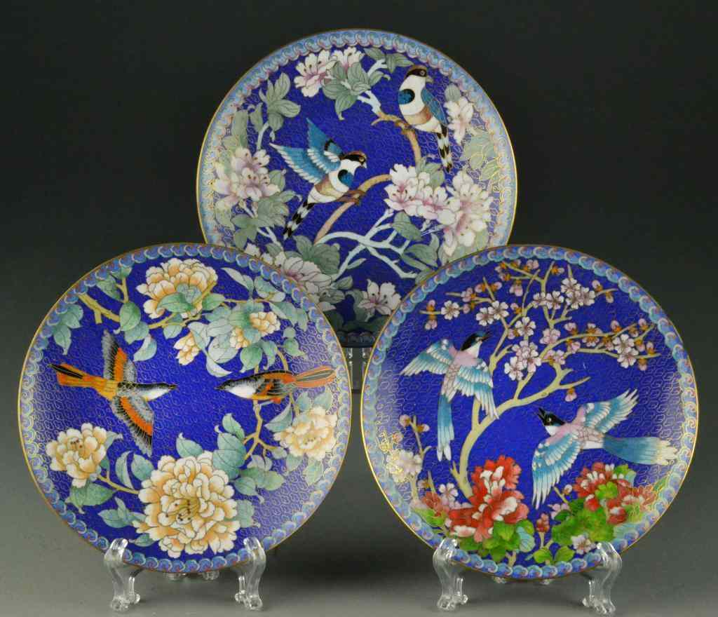 Appraisal: Chinese Cloisonne Footed PlatesEach enameled to depict lotus blossoms sparrows