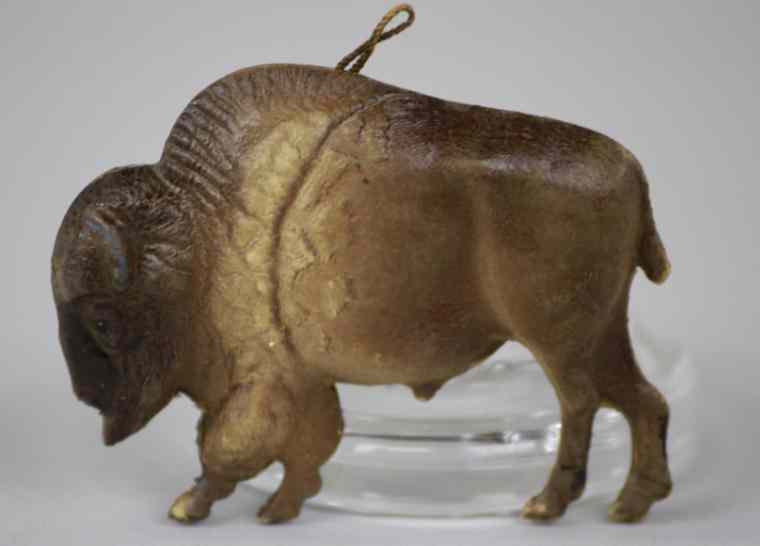 Appraisal: DRESDEN BUFFALO ORNAMENT Germany full figure walking buffalo very life-like