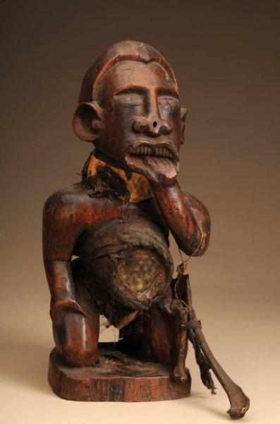 Appraisal: Central African Congo Fetish Figure Description Made of wood leather