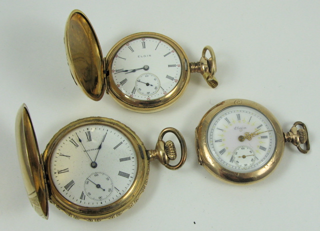 Appraisal: THREE AMERICAN POCKET WATCHES Elgin hunter case model size c