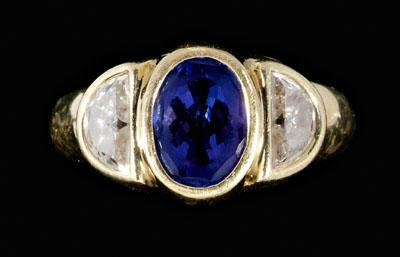 Appraisal: Tanzanite diamond ring central oval faceted tanzanite estimated weight cts