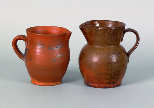 Appraisal: Two redware pitchers th c h and h