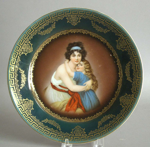 Appraisal: Painted porcelain plate with mother and daughter late th c