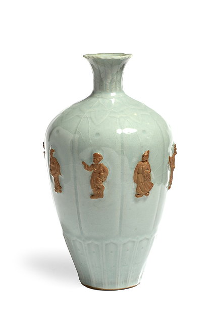 Appraisal: A Chinese porcelain celadon ground vaseQiing dynasty th Centuryeach of