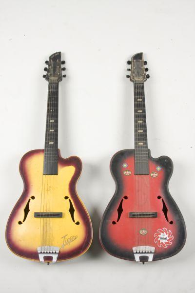 Appraisal: Two Vintage Plastic Guitars both ca the first an Emenee