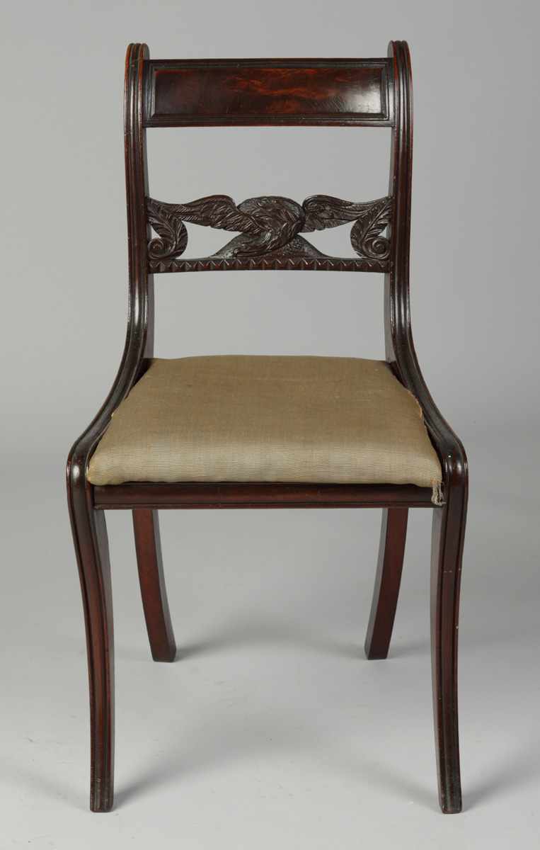 Appraisal: Empire Mahogany Chair w Eagle Stretcher Sabre legs Condition Old