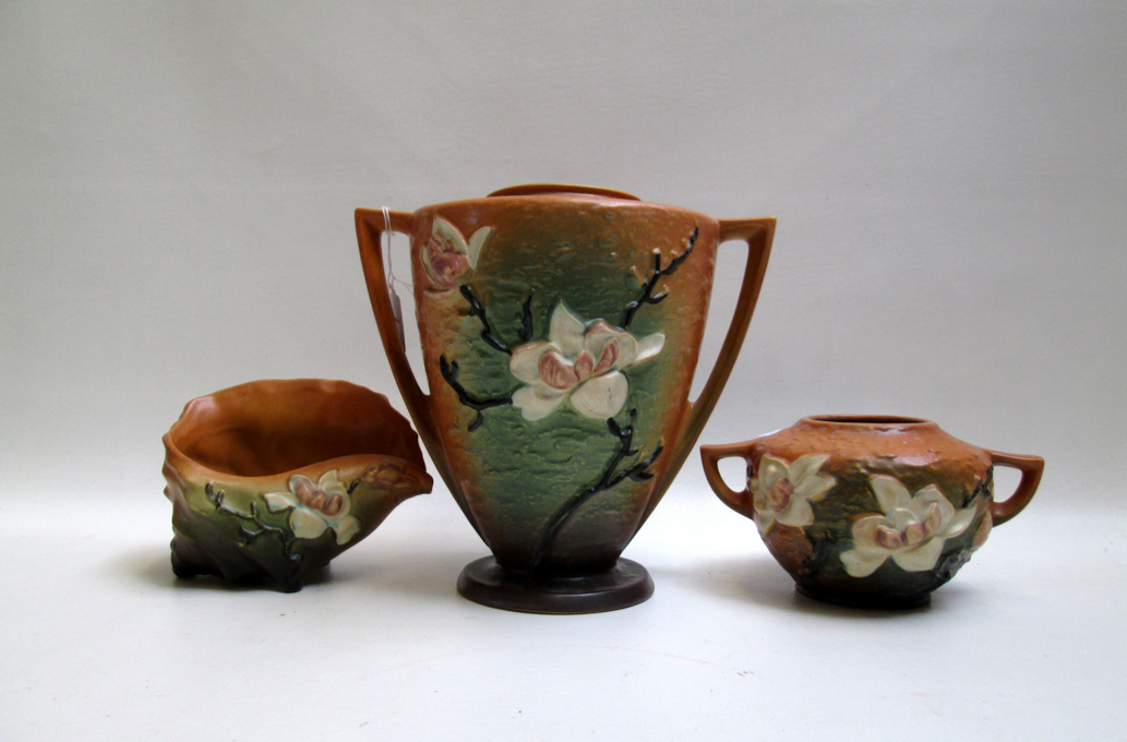 Appraisal: THREE ROSEVILLE ART POTTERY PIECES having brown glazes in the