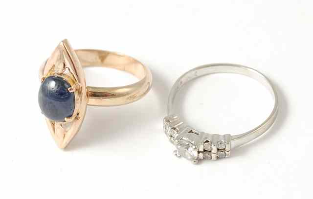 Appraisal: TWO LADY'S TEN KARAT GOLD RINGS yellow gold blue sapphire