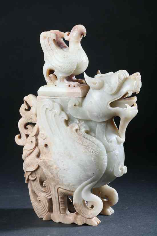 Appraisal: CHINESE ARCHAISTIC CELADON AND CAFE-AU-LAIT JADE MYTHICAL BEAST-FORM VASE AND