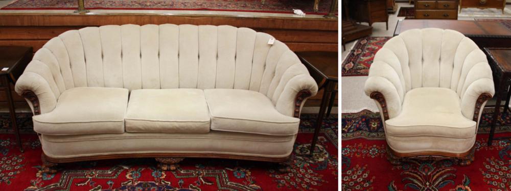 Appraisal: TRADITIONAL STYLE SOFA AND MATCHING ARMCHAIR SET French channel-back design