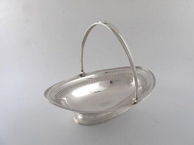 Appraisal: A George III silver swing-handled bread basket of oval form