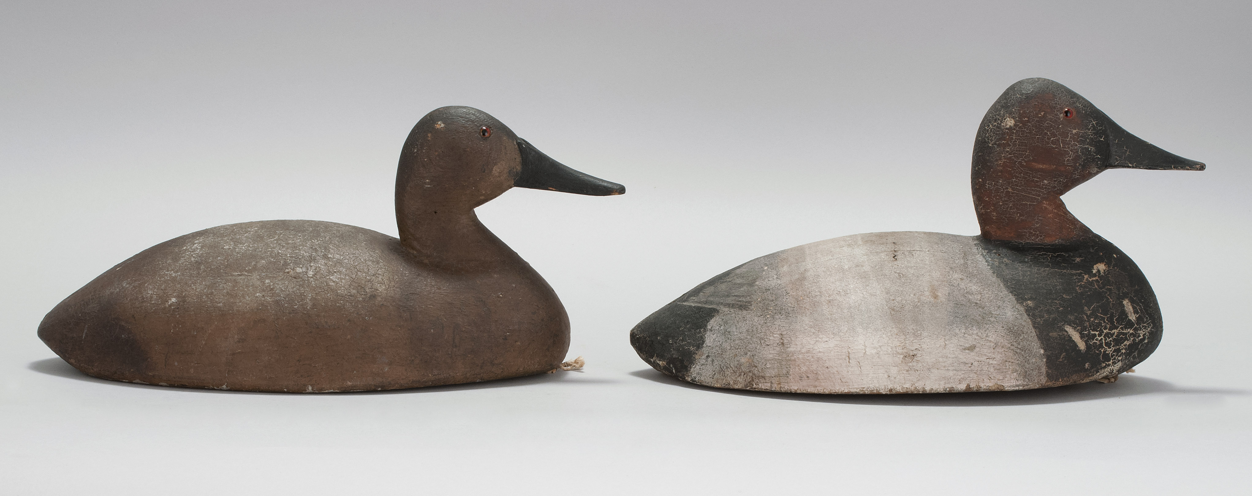 Appraisal: EXCEPTIONAL PAIR OF CANVASBACK DECOYS Second Quarter of the th