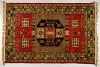 Appraisal: TURKISH SHIRVAN ORIENTAL RUG The central geometric medallion surrounded by