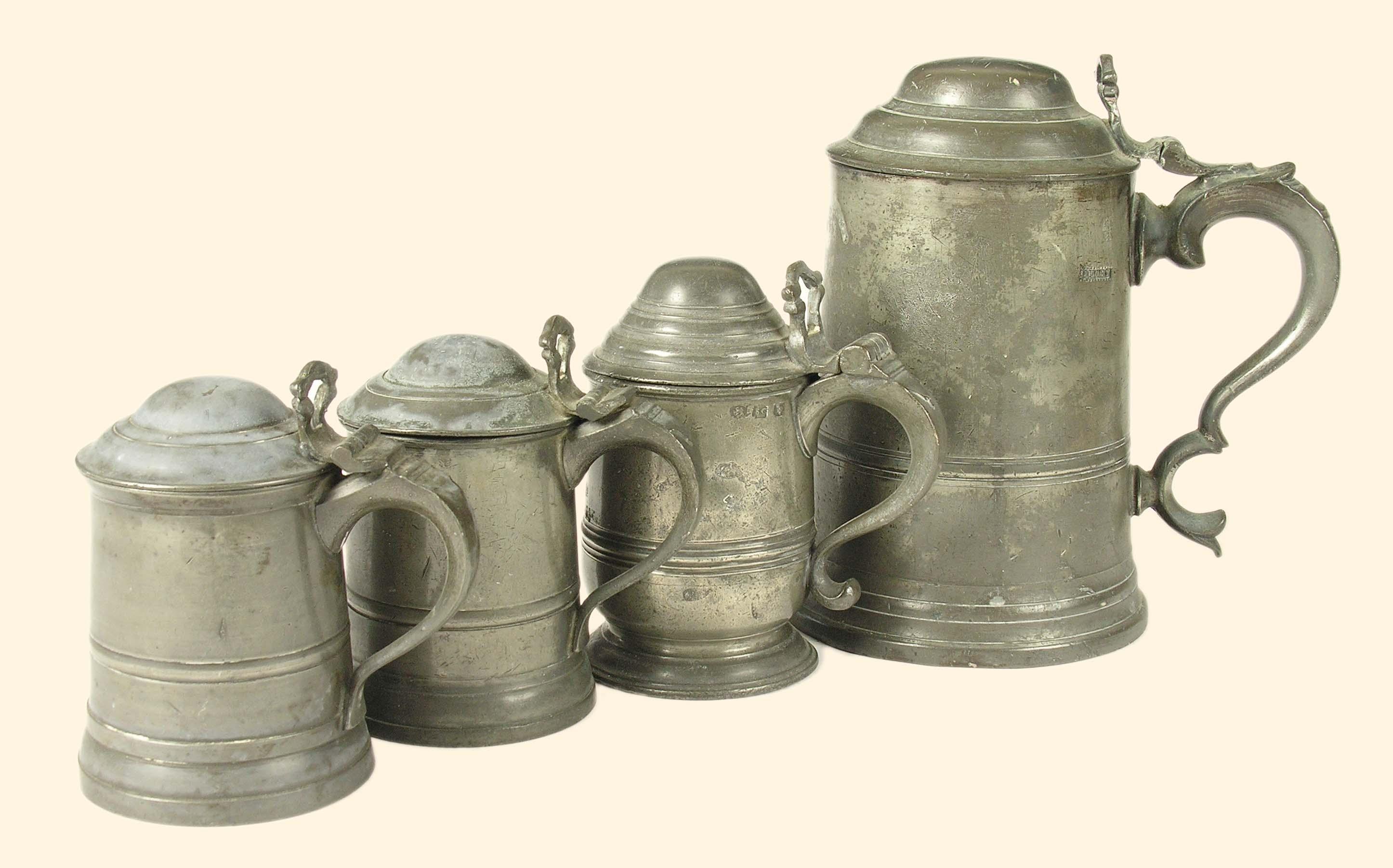 Appraisal: A th century pewter lidded quart tankard