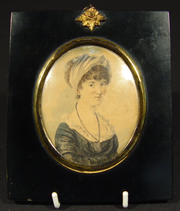 Appraisal: Early th Century oval portrait miniature onto paper of a