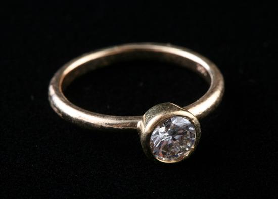 Appraisal: K YELLOW GOLD AND DIAMOND RING Brilliant-cut round diamond weighing