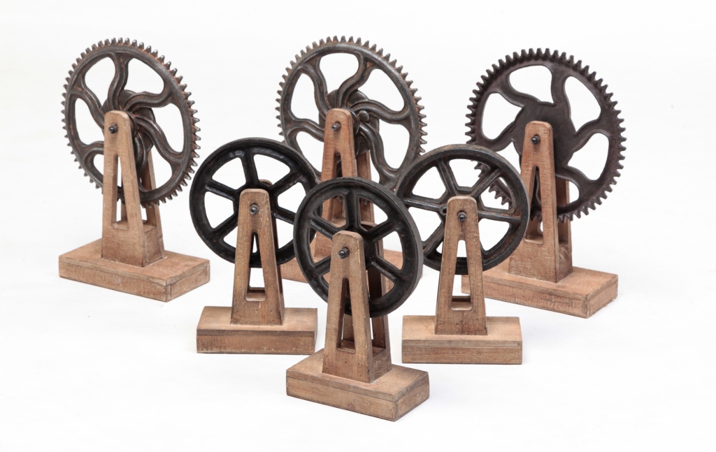 Appraisal: Early st century Cast iron gears and wheels on wooden