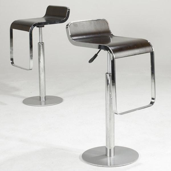 Appraisal: ITALIAN MODERN Pair of contemporary adjustable bar stools with wood