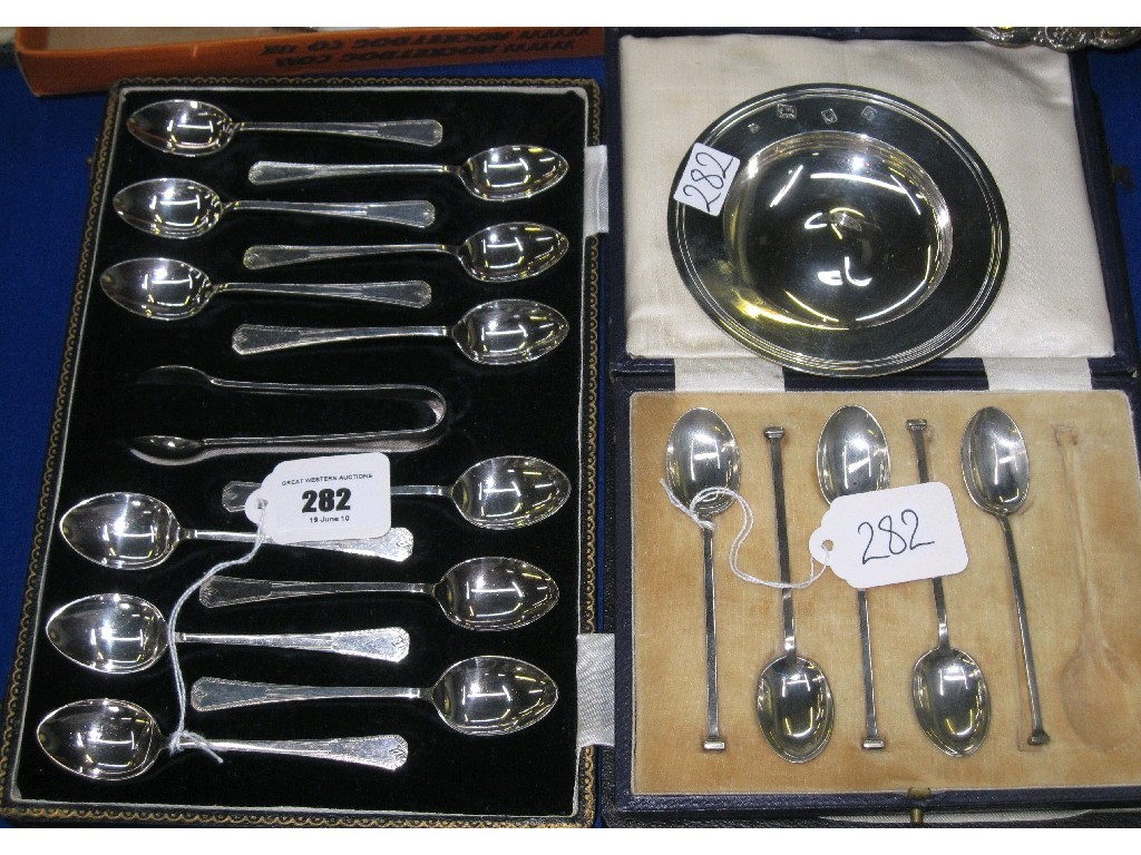 Appraisal: Lot comprising silver dish part set silver spoons and an