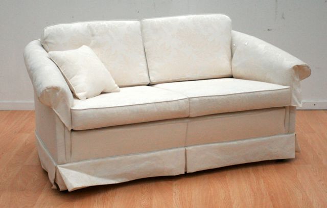 Appraisal: A pair of fabric upholstered two seater sofas