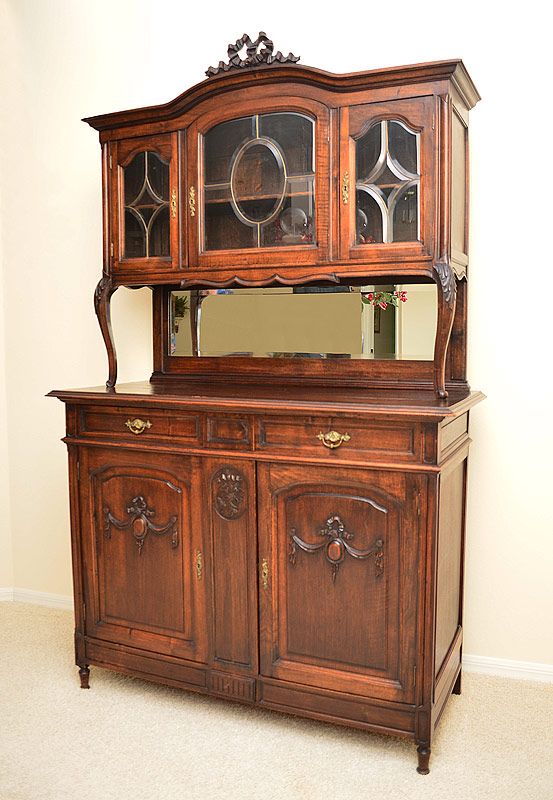 Appraisal: FRENCH MAHOGANY BUFFET SIDEBOARD Shaped top with paneled glass doors