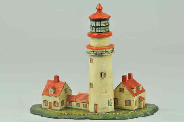 Appraisal: HIGHLAND LIGHTHOUSE DOORSTOP Embossed ''Highland Light Cape Cod'' on base