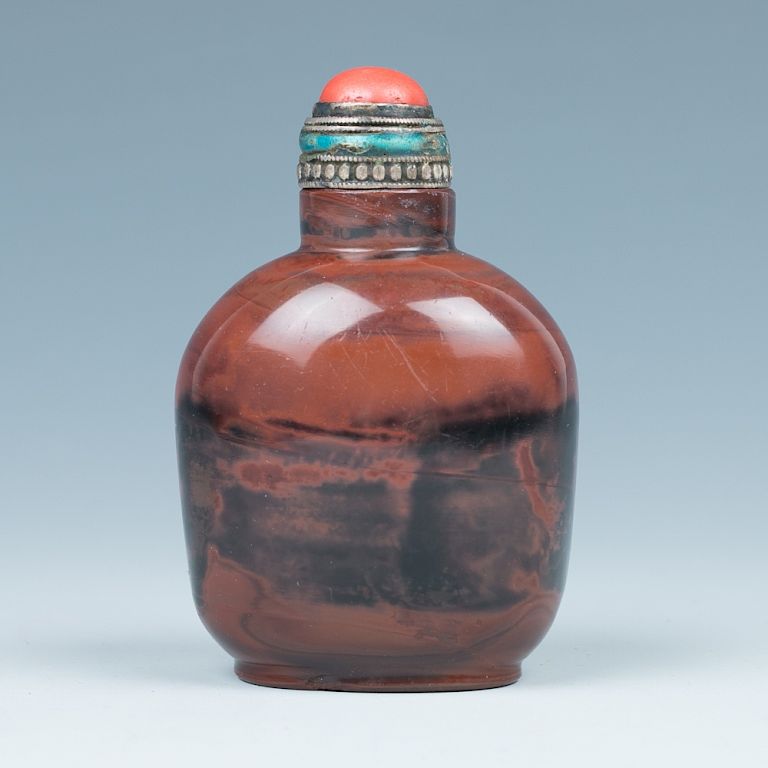 Appraisal: AGATE SNUFF BOTTLE Of compressed ovoid body on short foot