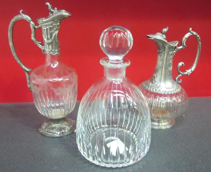 Appraisal: THREE GLASS DECANTERS THREE GLASS DECANTERS No Entry