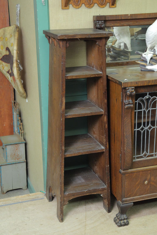 Appraisal: ARTS AND CRAFTS BOOKCASE Oak and of tapered form with