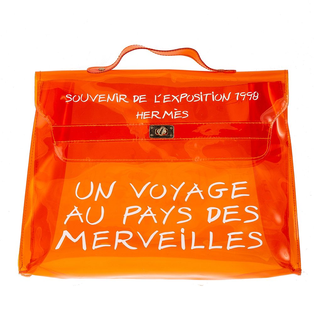 Appraisal: A Hermes Souvenir De L'Exposition Kelly An orange vinyl Hermes