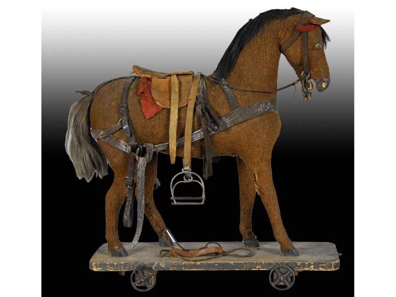 Appraisal: Toy Horse on Wheels with Accessories Description '' L -