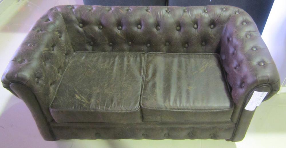 Appraisal: A CHILD'S BROWN LEATHER BUTTON BACK CHESTERFIELD CM X CM