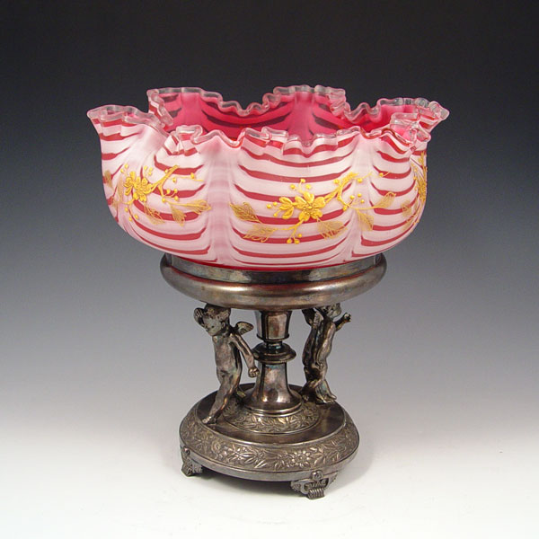 Appraisal: CRANBERRY SATIN GLASS NAILSEA BRIDES BASKET WITH CHERUB FIGURAL STAND