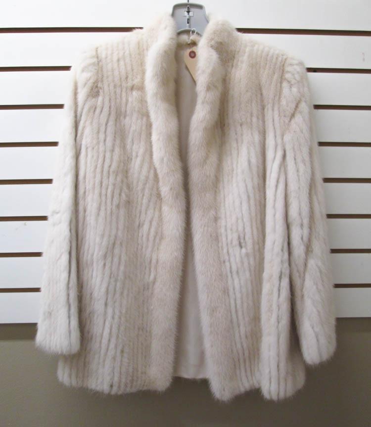 Appraisal: LADY'S MINK FUR COAT white fur with two exterior and