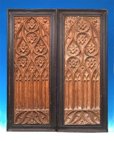 Appraisal: A pair of antique carved oak Gothic panels in ebonised