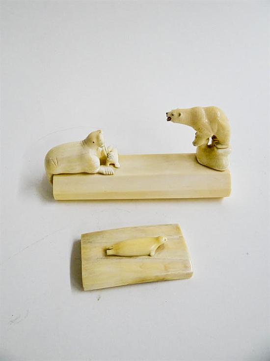 Appraisal: TWO IVORY CARVINGS Inuit st half- th century Diorama with