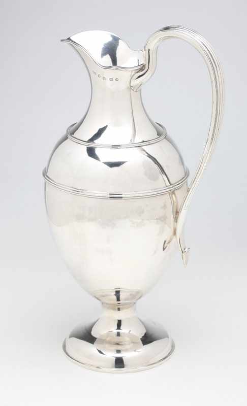 Appraisal: A Victorian sterling silver ewer Rolason Brothers Birmingham with maker's