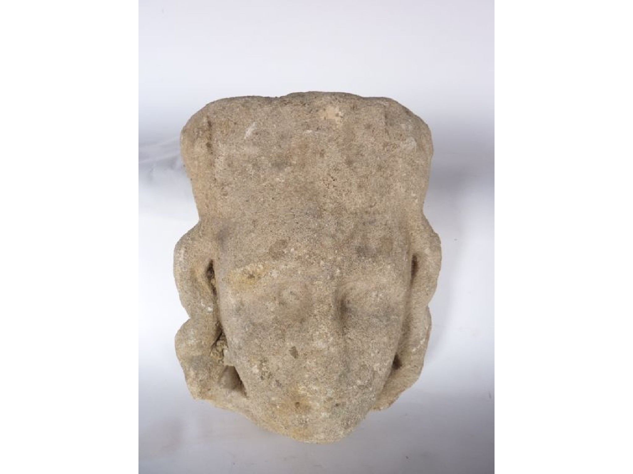 Appraisal: A substantial early carved limestone corbel blockade in the form