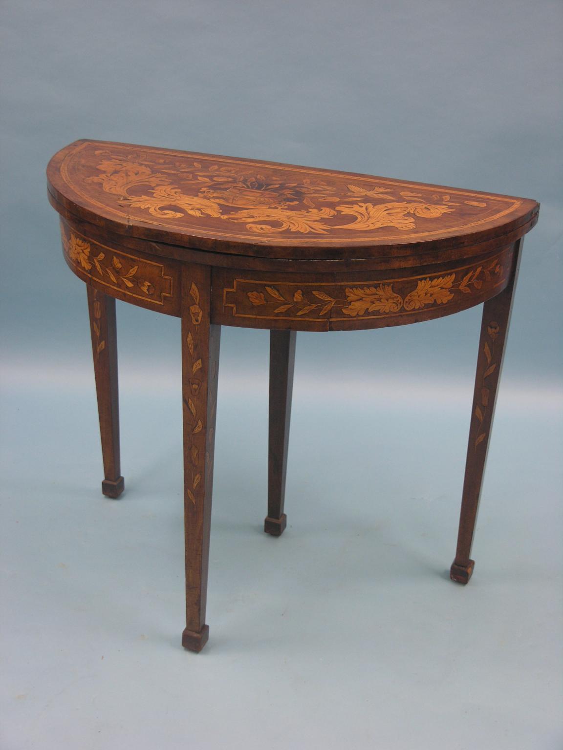 Appraisal: A late th century Dutch marquetry card table half-round form