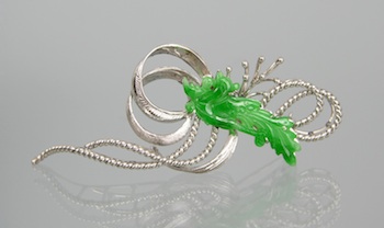 Appraisal: An k Gold and Jadeite Brooch k white gold brooch